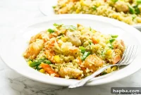 Vibrant African Chicken and Shrimp Fried Rice
