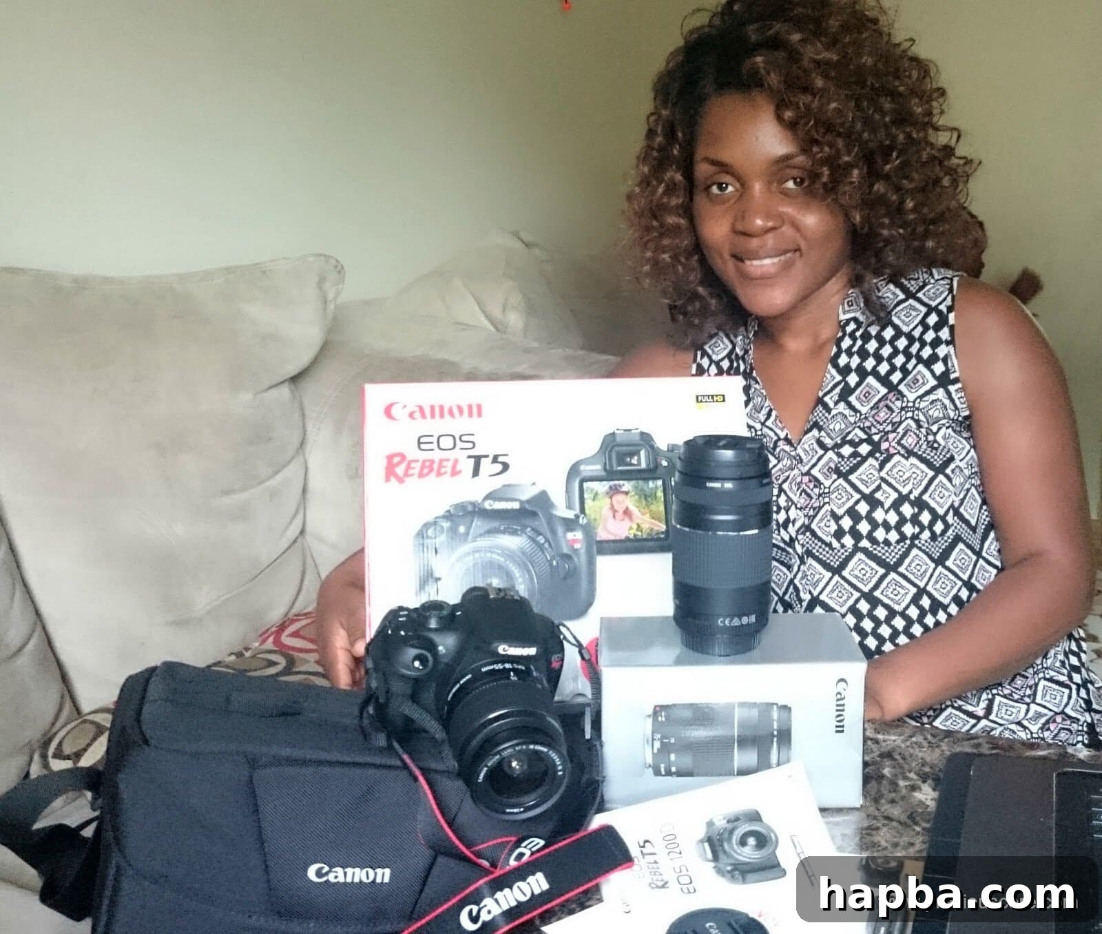 Close-up of the new Canon EOS Rebel T5 DSLR camera with lenses.