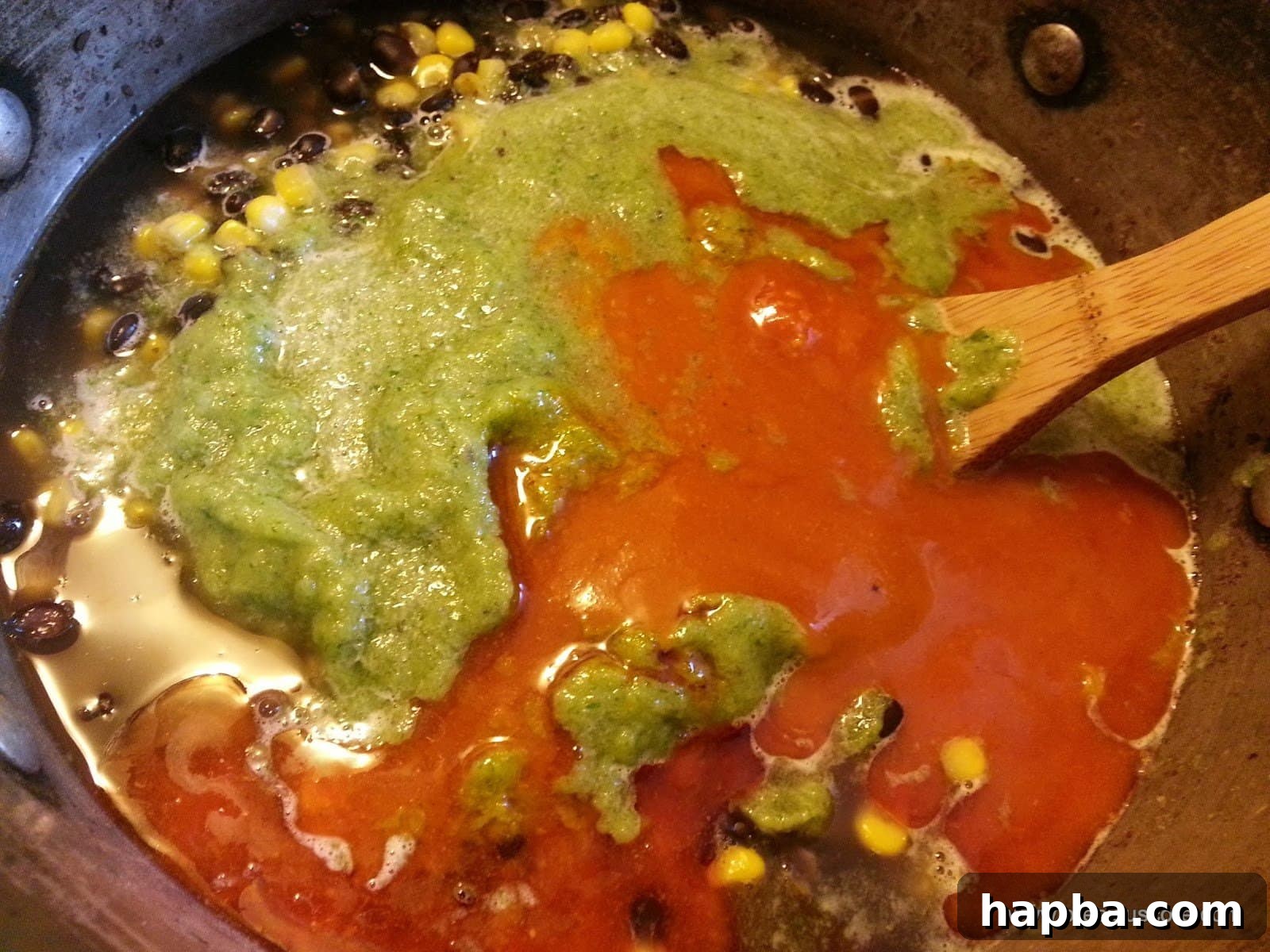 Adding Palm Oil and Seasoning to Corn Chaff