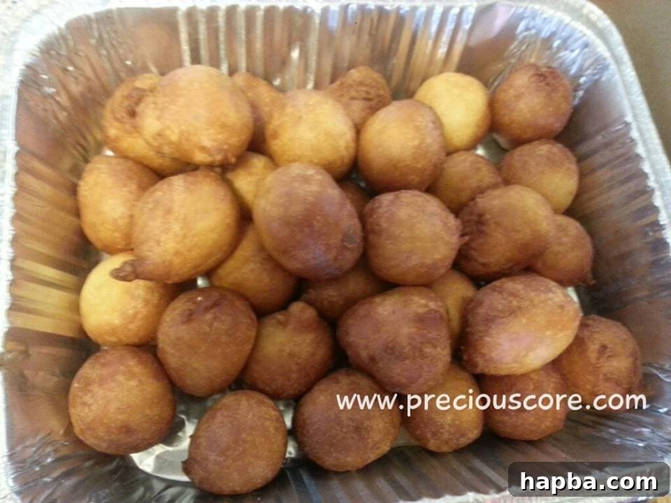 Golden brown 'Ajebutter' Puff Puff, thicker and richer, ready to be enjoyed