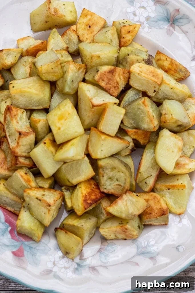 Crispy Oven Potatoes 2 roasted potatoes on a platter