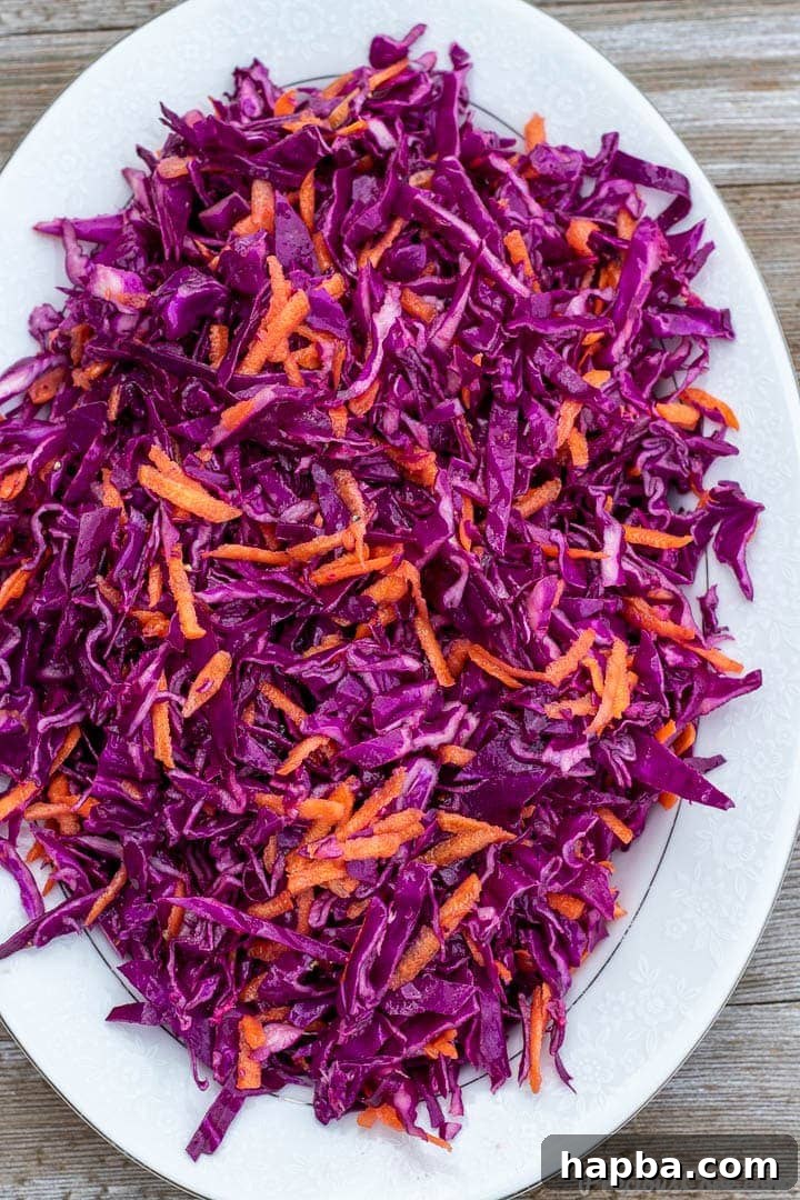 Crimson Crisp Slaw 2 Vibrant Red Cabbage Slaw on a platter, ready to be served