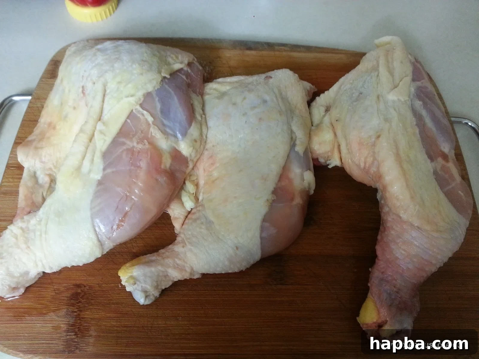 Preparing Fresh Chicken for Frying Fresh whole chicken, ready for preparation and cooking