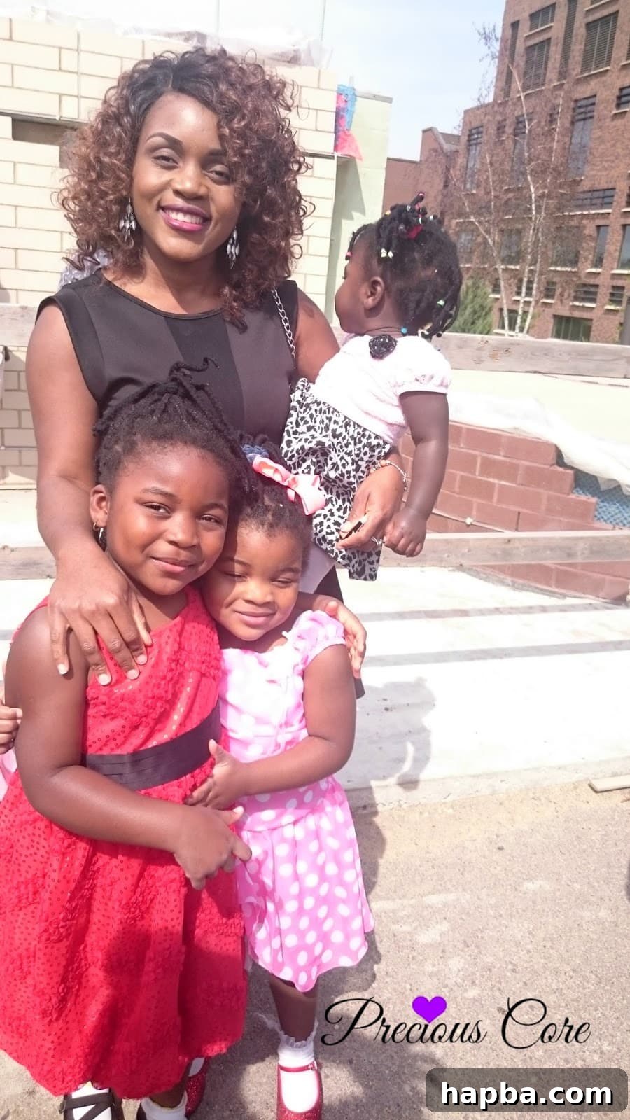 The Week's Party Forecast 5 A heartwarming candid photo of the author smiling brightly alongside her daughters at a family celebration.