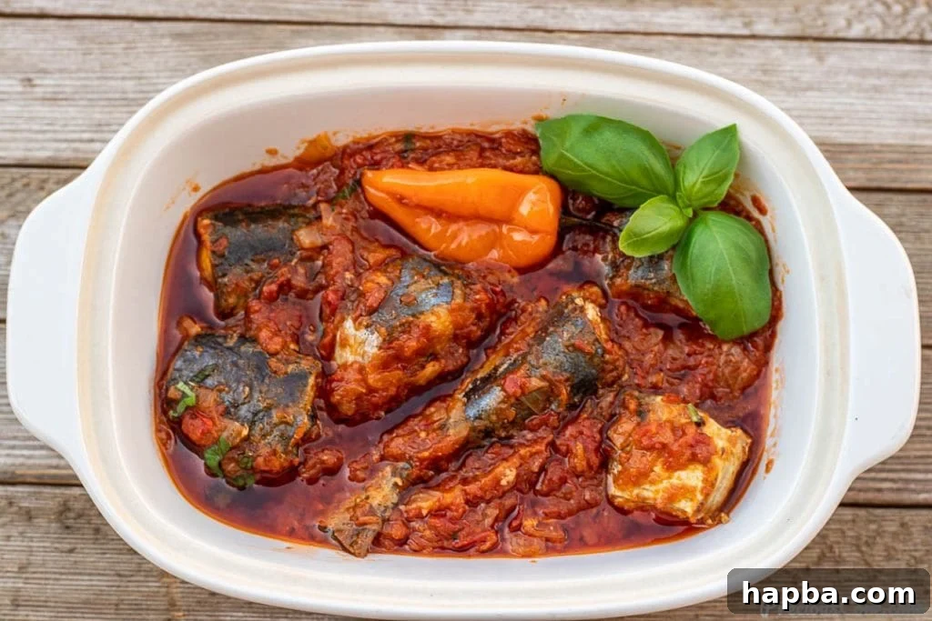 A freshly cooked Cameroonian Tomato Fish Stew, presented in an elegant serving bowl, ready to be enjoyed.