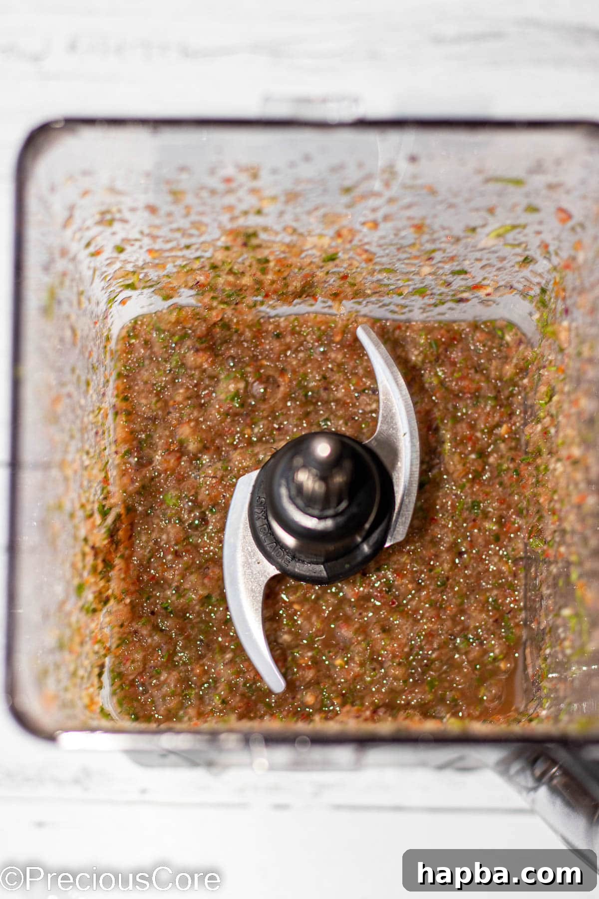 African Fire Sauce 5 Pepper sauce ingredients blended in a blender.