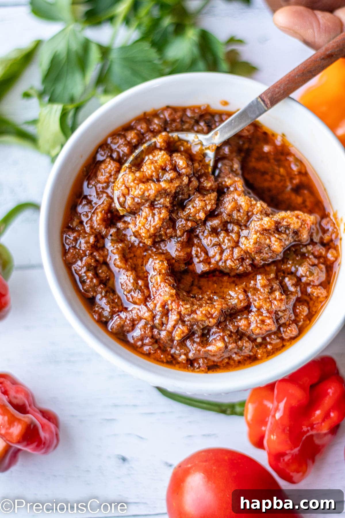 African Fire Sauce 6 Spicy sauce in a white deep bowl.