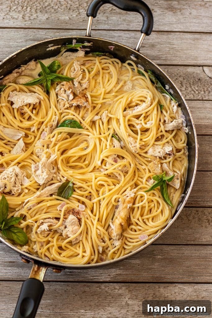 Hearty Weeknight Chicken Spaghetti 5 creamy spaghetti in a pan