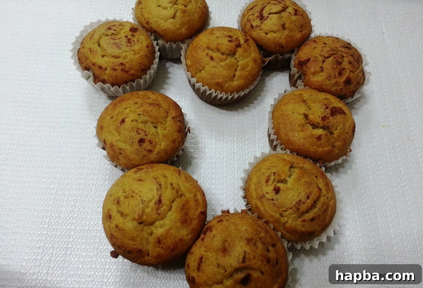 Beautifully arranged Cameroonian banana cakes in the shape of a heart, conveying warmth and affection.