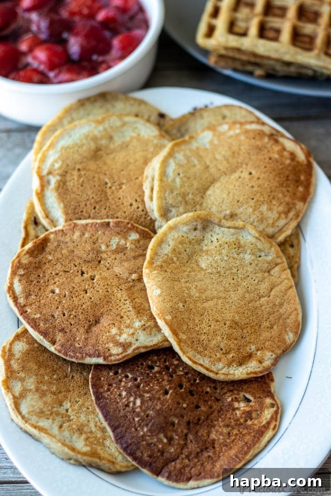 Stack of freshly made plantain pancakes on a platter