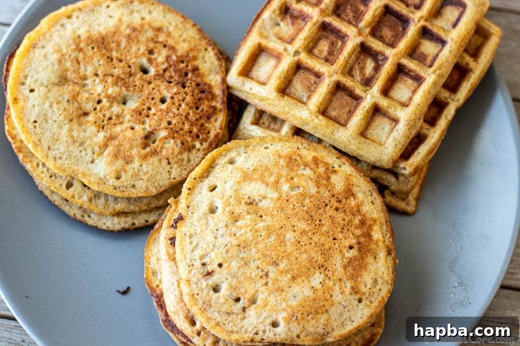 A platter featuring both plantain pancakes and plantain waffles, ready to be served