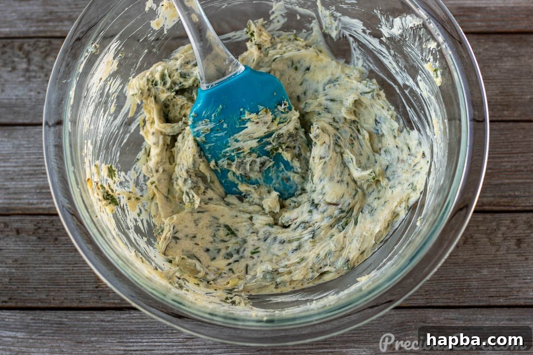 Herb-Crusted Roast Turkey 3 Garlic herb butter in a bowl, showing the fragrant mixture ready for application