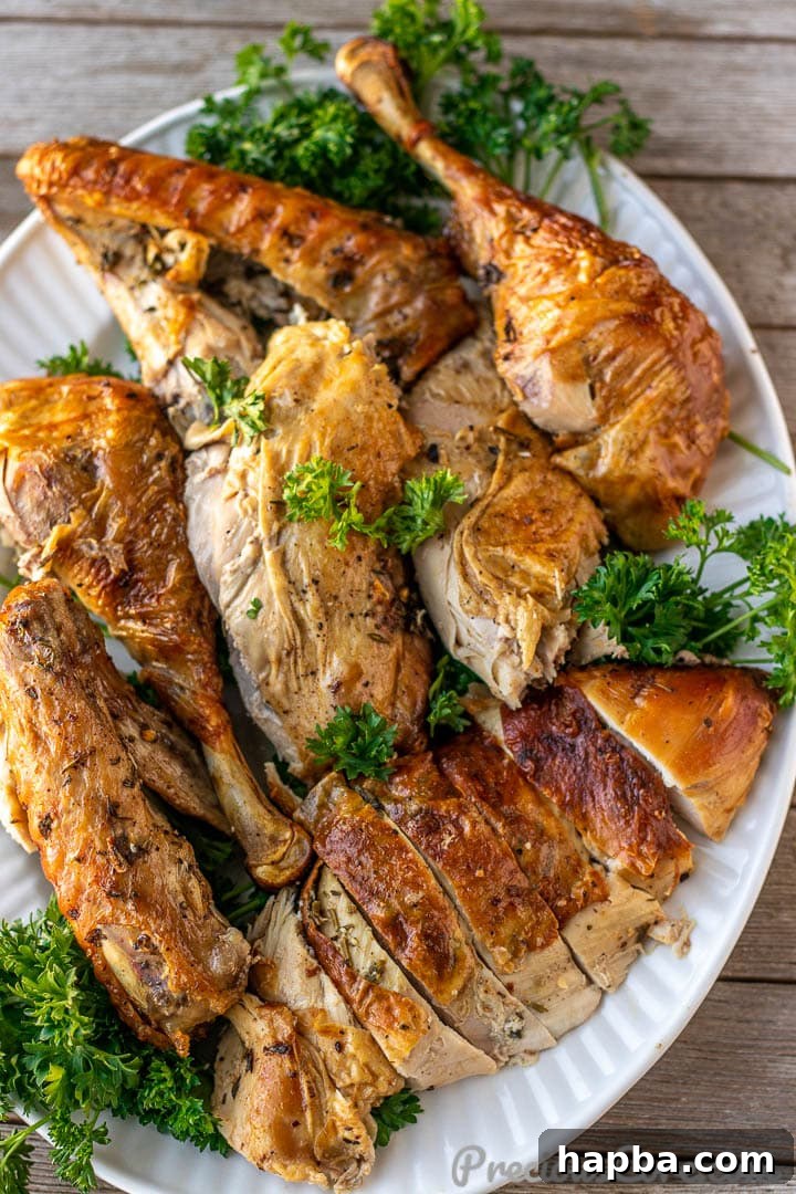 Herb-Crusted Roast Turkey 7 A platter of beautifully carved herb roasted turkey, ready for serving
