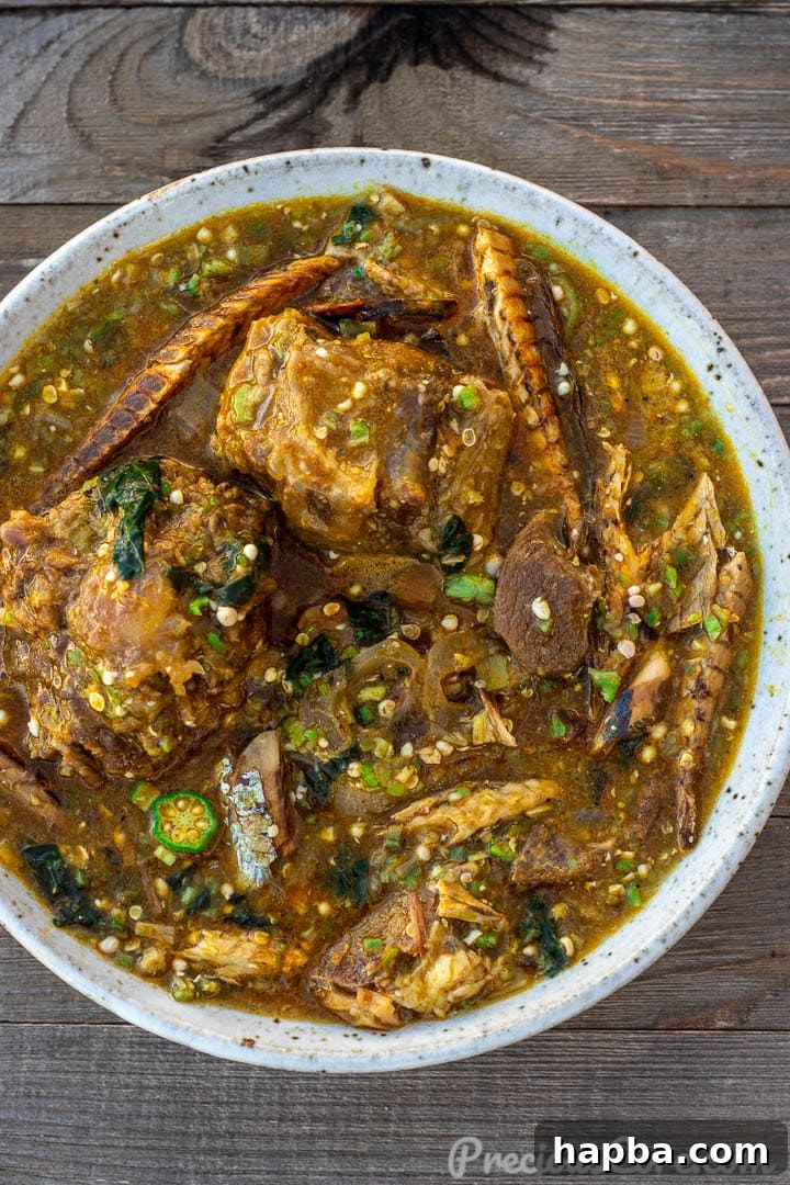 Vibrant African Okra Soup 4 A close-up shot of a vibrant bowl of African okra soup, highlighting its rich texture and colorful ingredients.