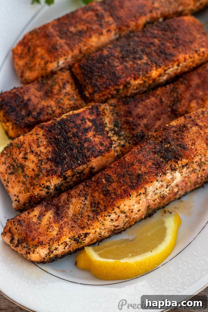 Golden Pan Seared Salmon 11 A close-up shot of a perfectly pan-grilled salmon fillet, showcasing its crisp skin and juicy texture.