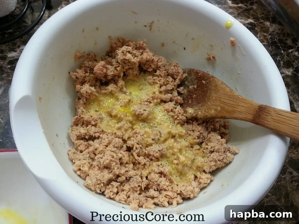 Mashed fish mixture combined with garlic, ginger, parsley, and beaten eggs