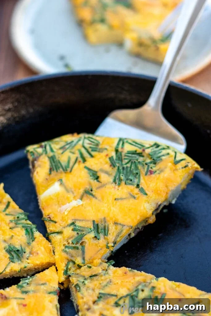 Hearty Potato Egg Bake 4 Several slices of Potato Frittata arranged artfully, revealing the layers of eggs, potatoes, and mushrooms.