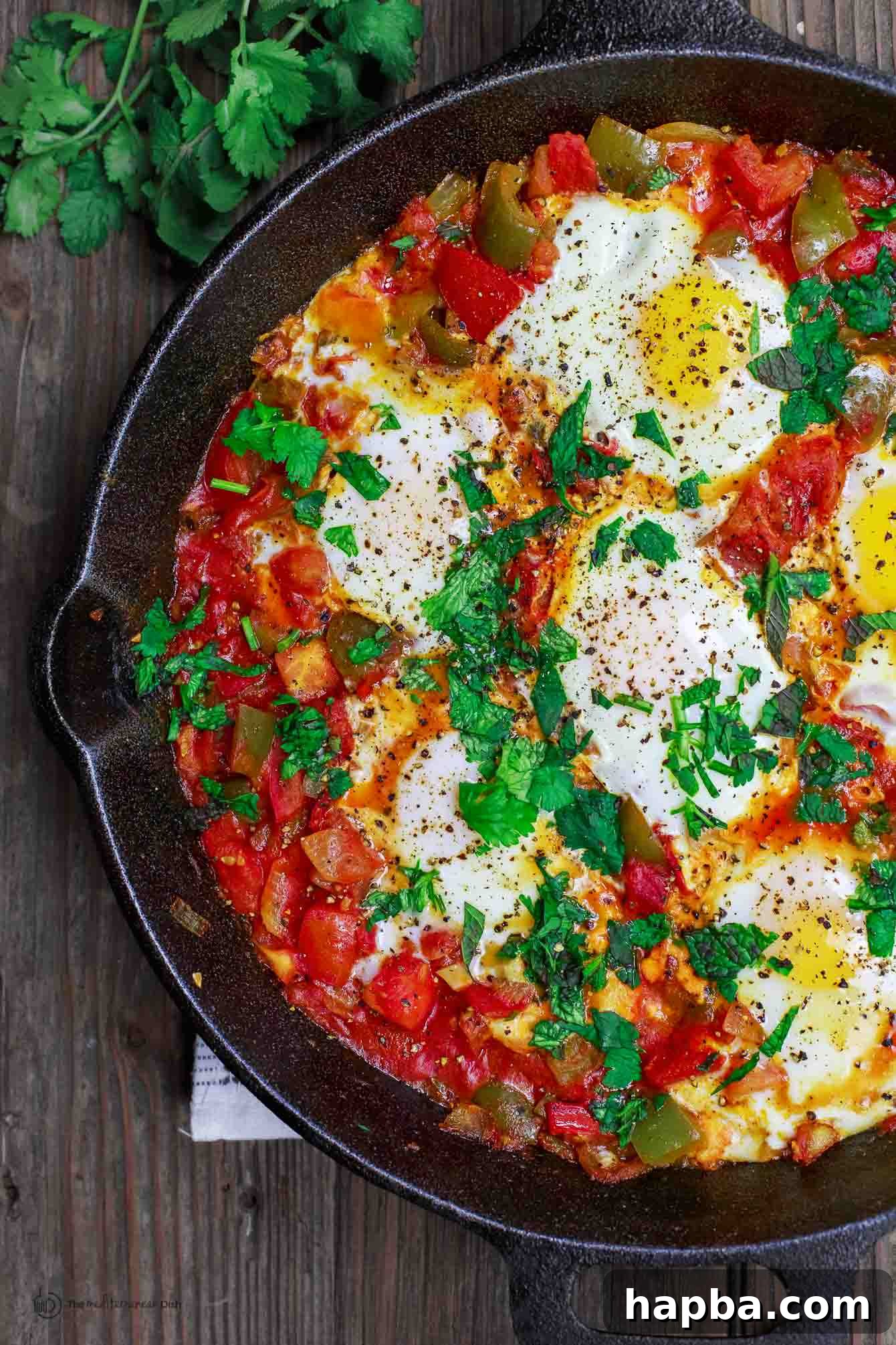 A Culinary Safari: 20 African Dinner Dishes 29 Shakshuka in a cast iron skillet