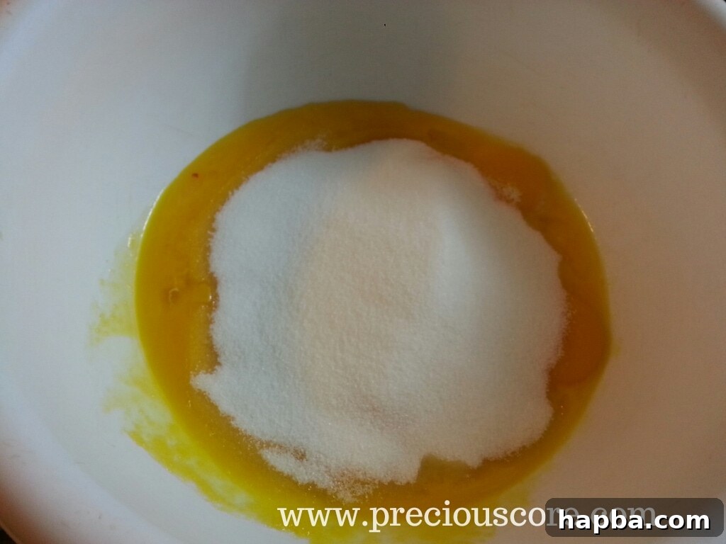 Sugar added to egg yolks