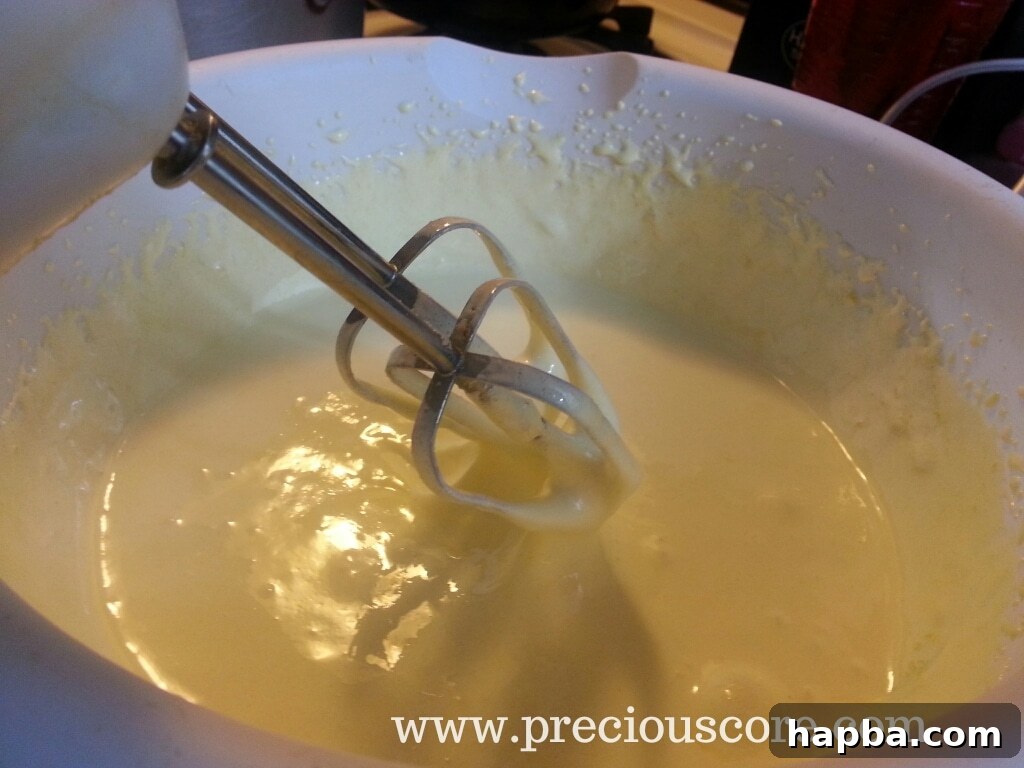 Whisked egg yolks and sugar showing consistency