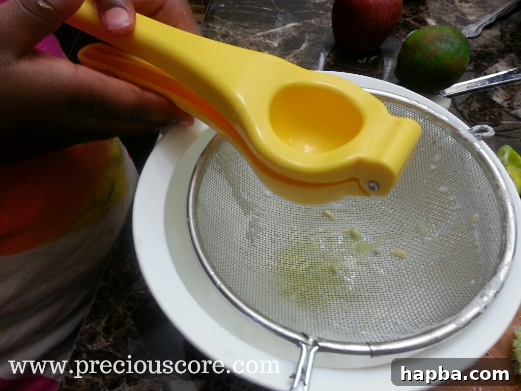 Squeezing key lime juice