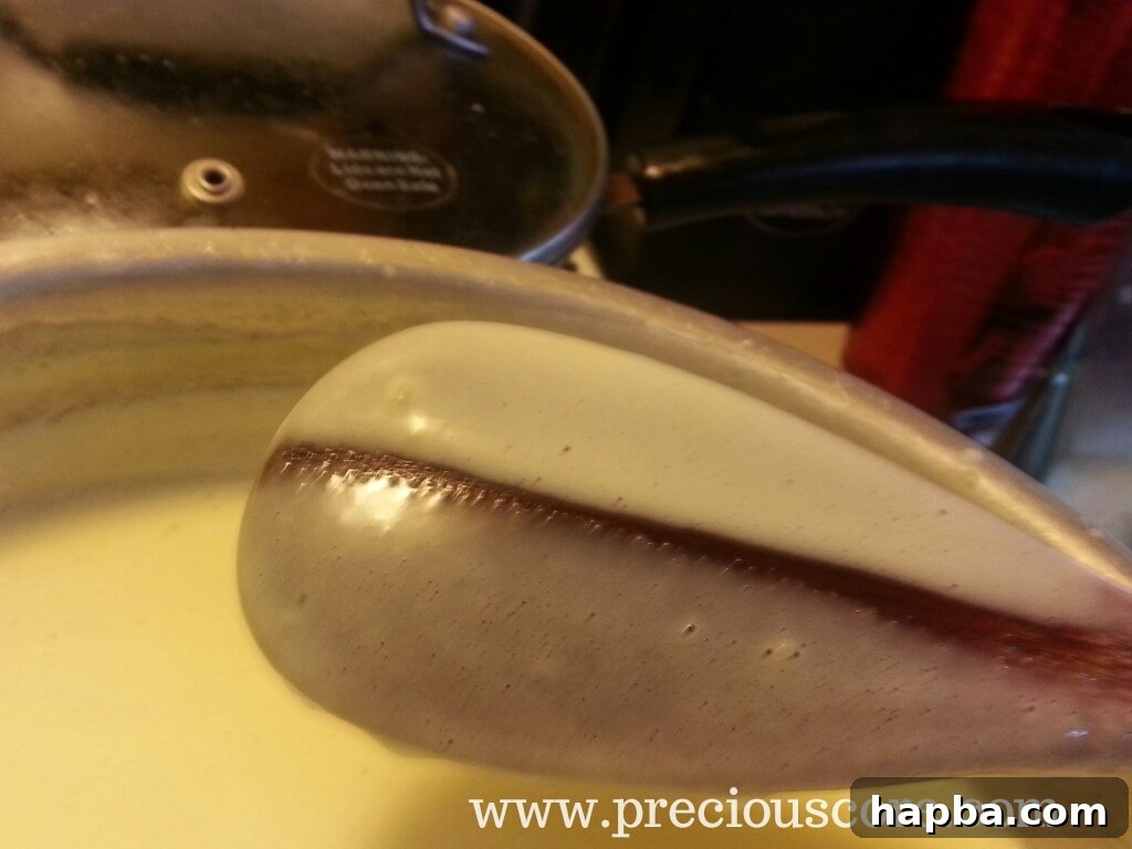 Custard thickening on a spoon