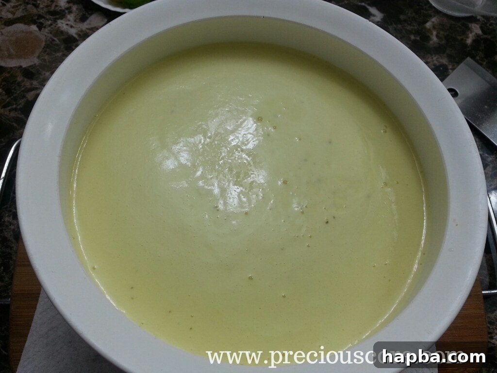Warm custard poured into a bowl