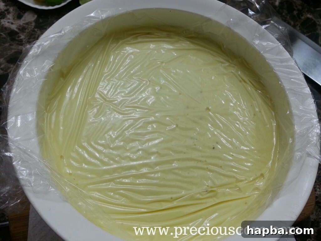 Custard covered with plastic wrap