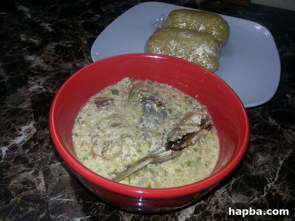 Crafting Delicious Okra Egusi Soup 3 Okra Egusi Soup with garri, ready to be enjoyed