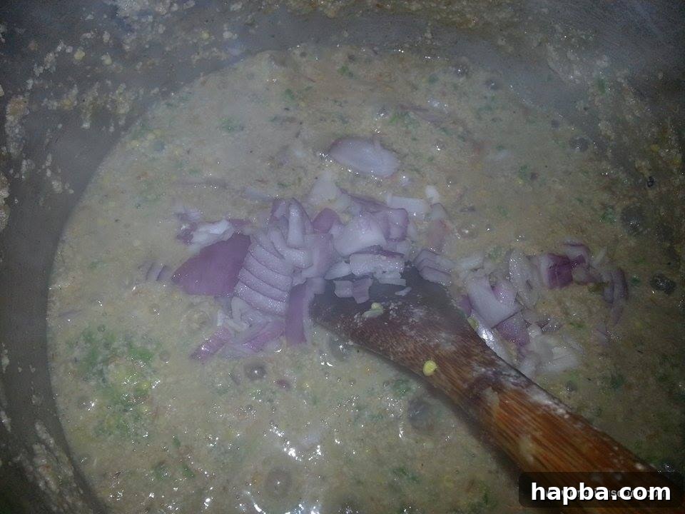Crafting Delicious Okra Egusi Soup 8 Chopped onions added to the okra egusi soup