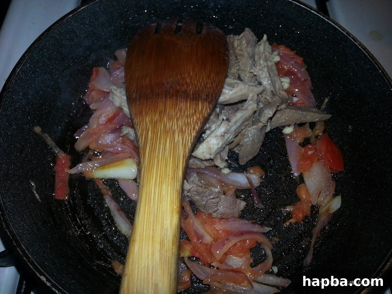 Fragrant garlic added to the softened onion and tomato mixture.