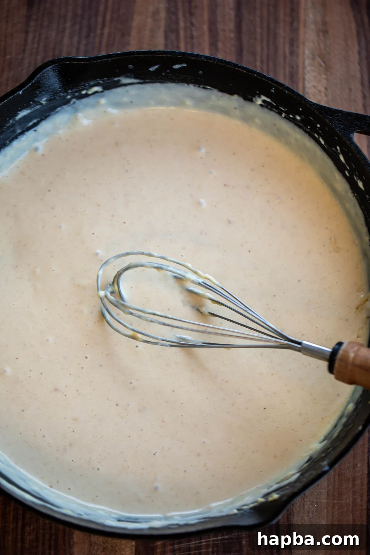 Creamy Triple Cheese Macaroni 5 Skillet of cheese sauce