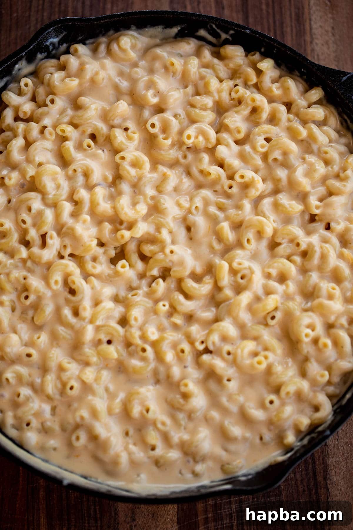 Creamy Triple Cheese Macaroni 6 macaroni tossed with cheese sauce