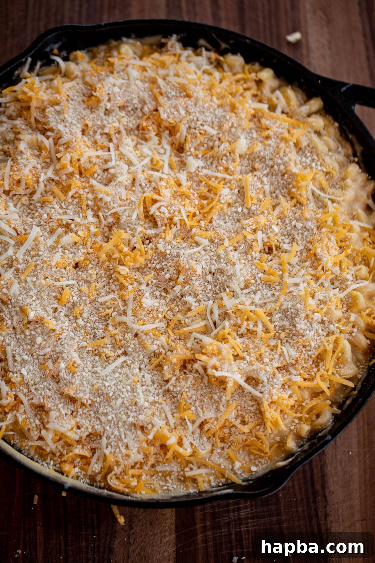 Creamy Triple Cheese Macaroni 7 Mac and cheese topped with shredded cheese and breadcrumbs
