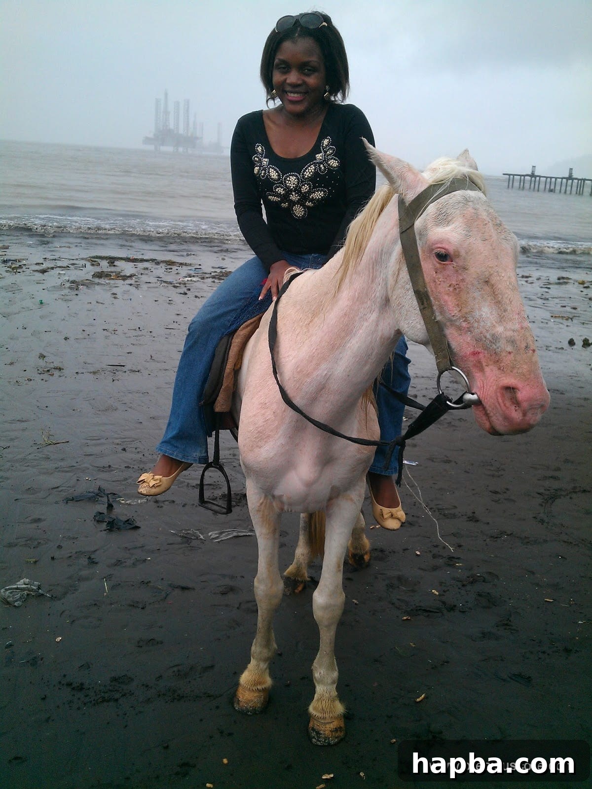 Horseback riding on Limbe Down Beach, Cameroon