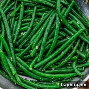 Square image of bright green beans.