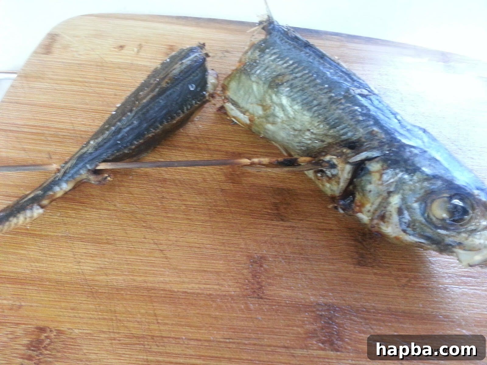 Fish baking in a pre-heated oven at 400 degrees Fahrenheit