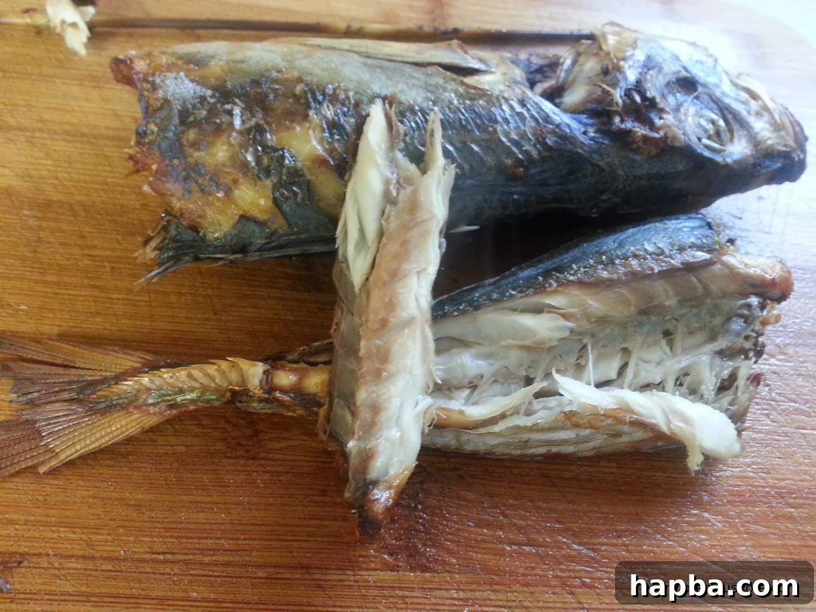 Chef enjoying a piece of the freshly dried fish