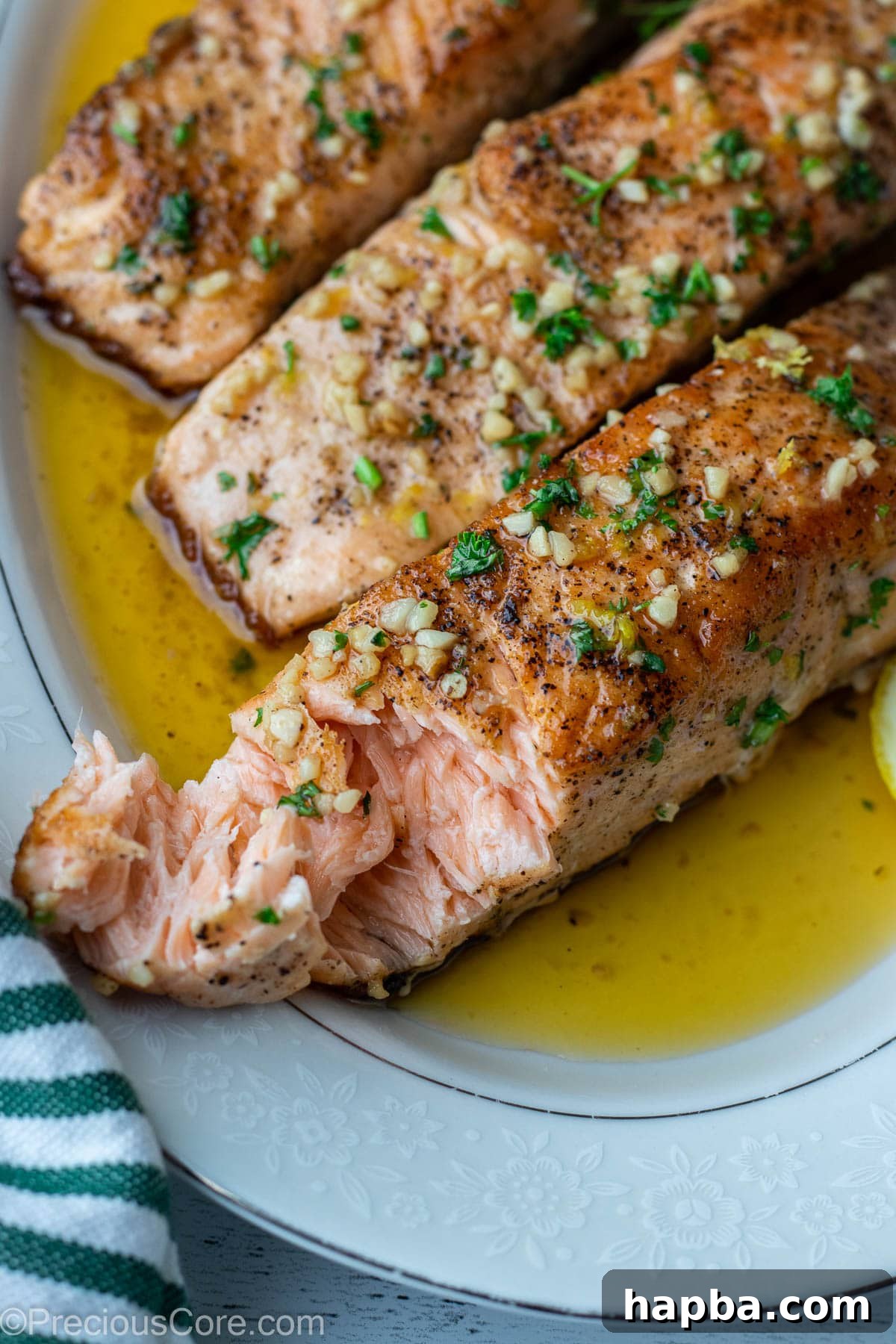 Zesty Lemon Butter Salmon 9 Faked salmon on a platter to show juiciness.