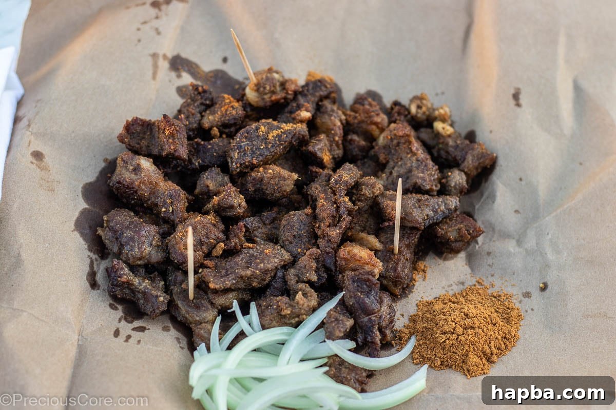 Cameroonian Soya Morsels 9 Soya served on brown paper, a traditional and inviting presentation.