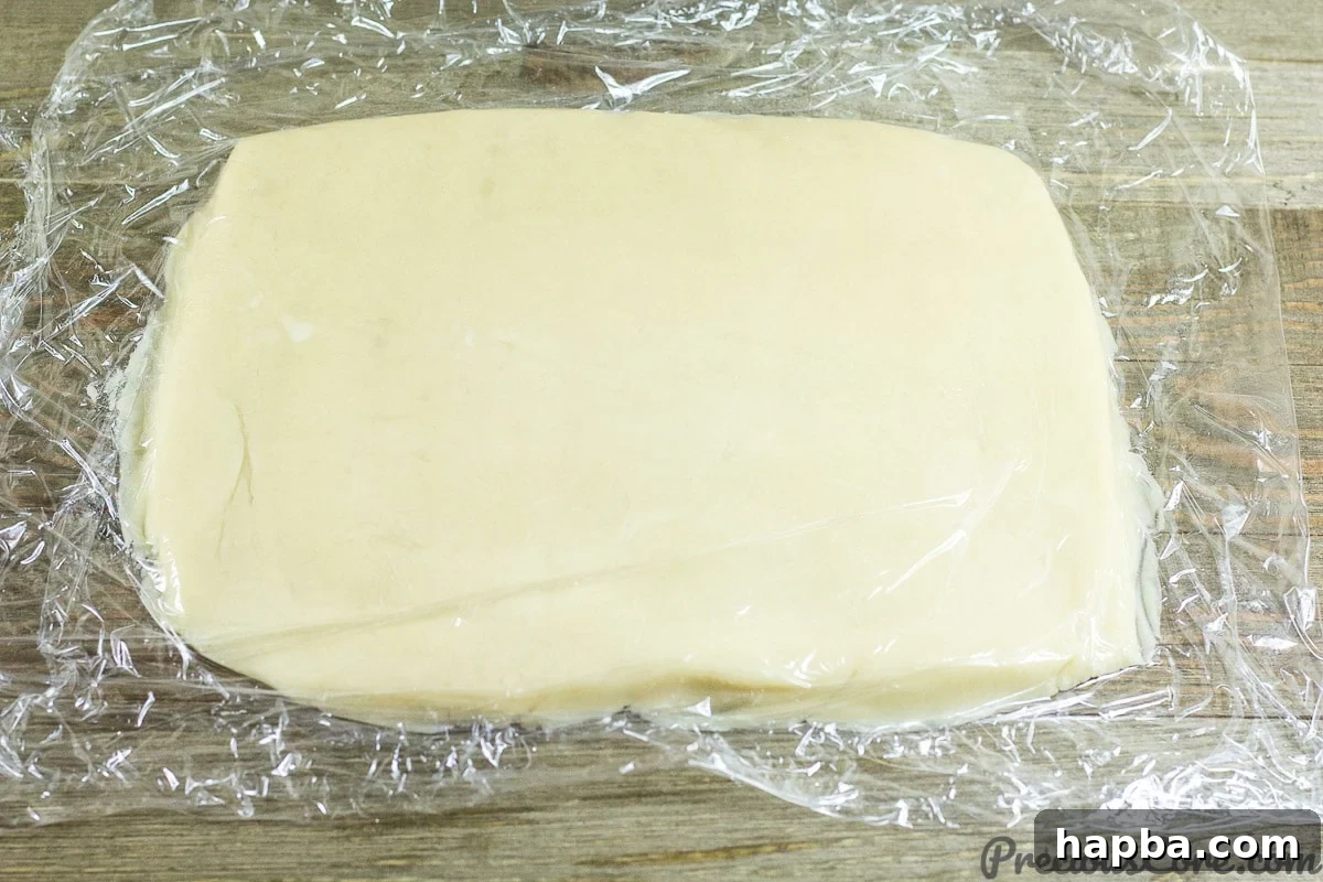 Rolling out dough for homemade shortbread cookies.