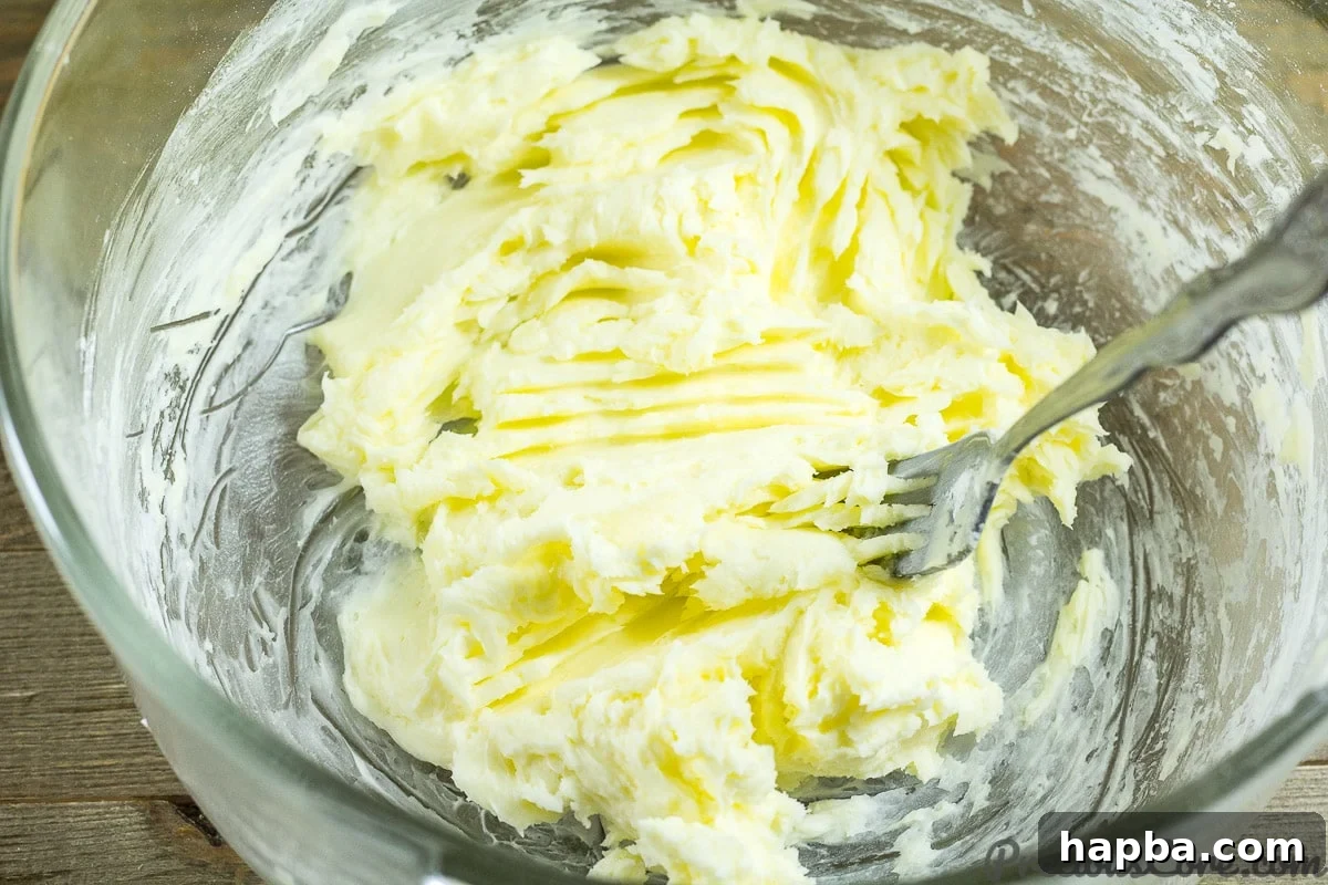 Creaming butter and sugar for shortbread cookies.