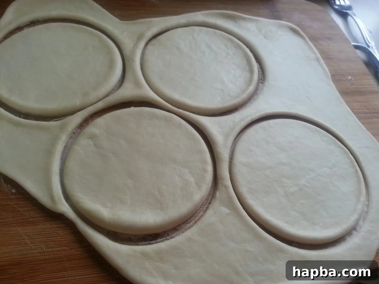 Multiple dough circles cut and ready