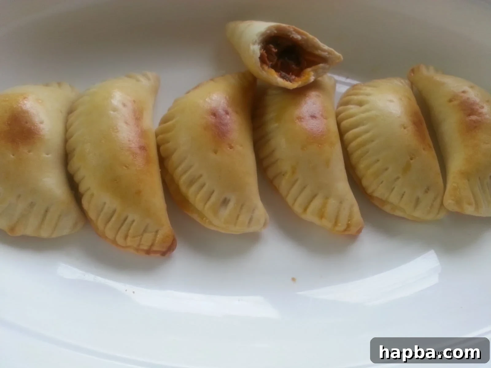 Golden-brown fish pies fresh out of the oven