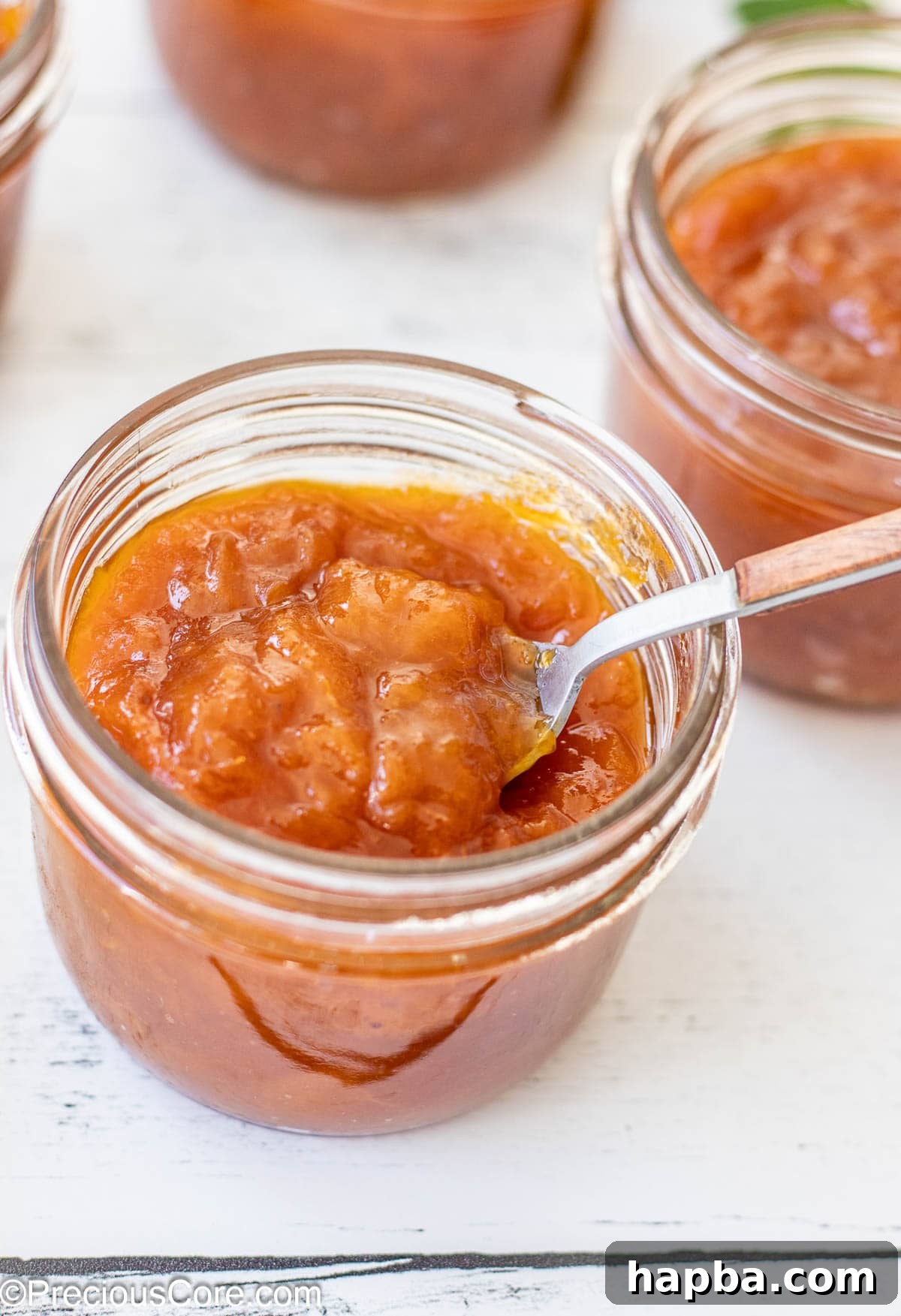 Sunshine Apricot Spread 2 A beautiful jar of homemade apricot preserves, ready to be enjoyed.