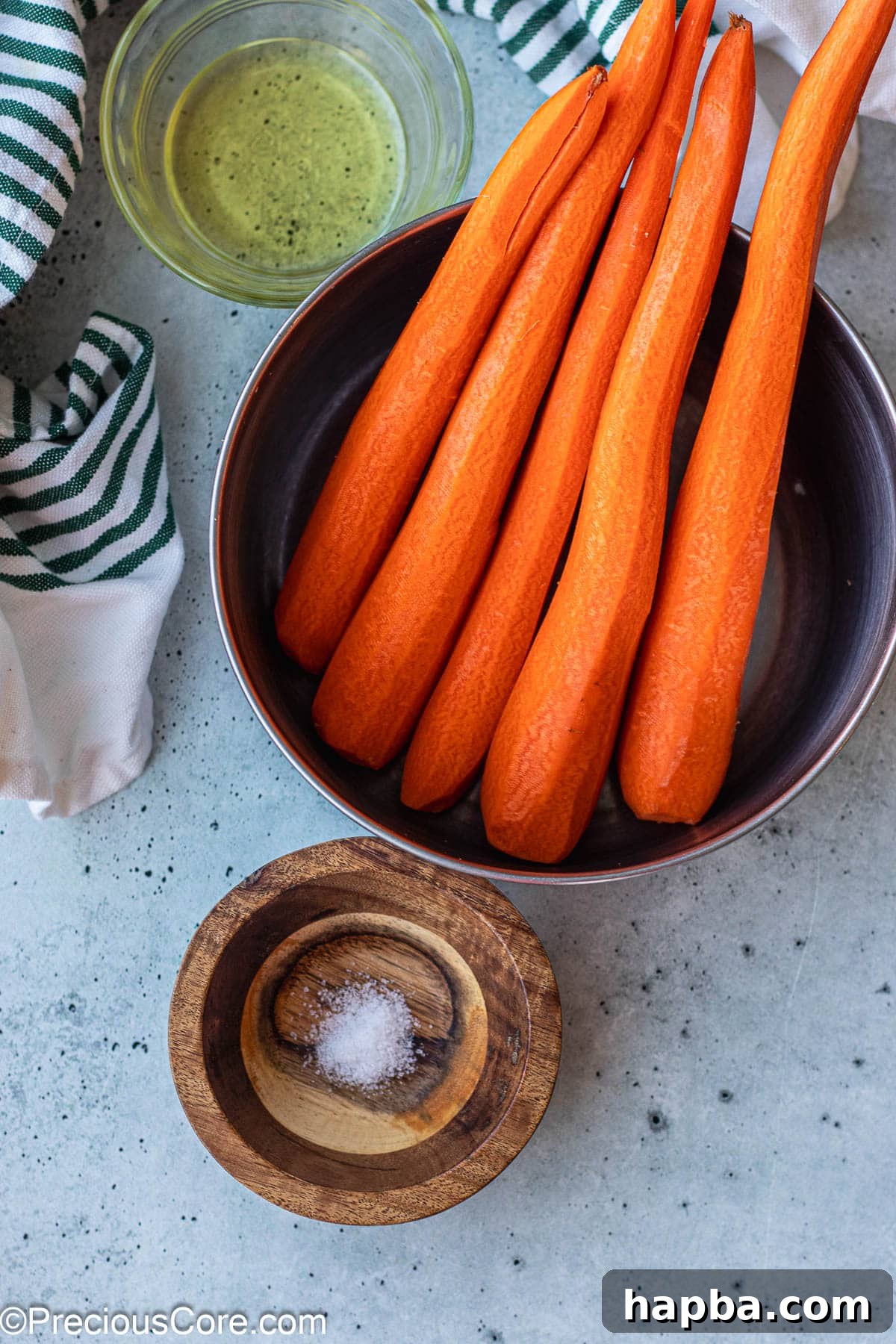 Caramelized Carrots 3 Fresh carrots, a bottle of olive oil, and a pinch of salt, the three essential ingredients.