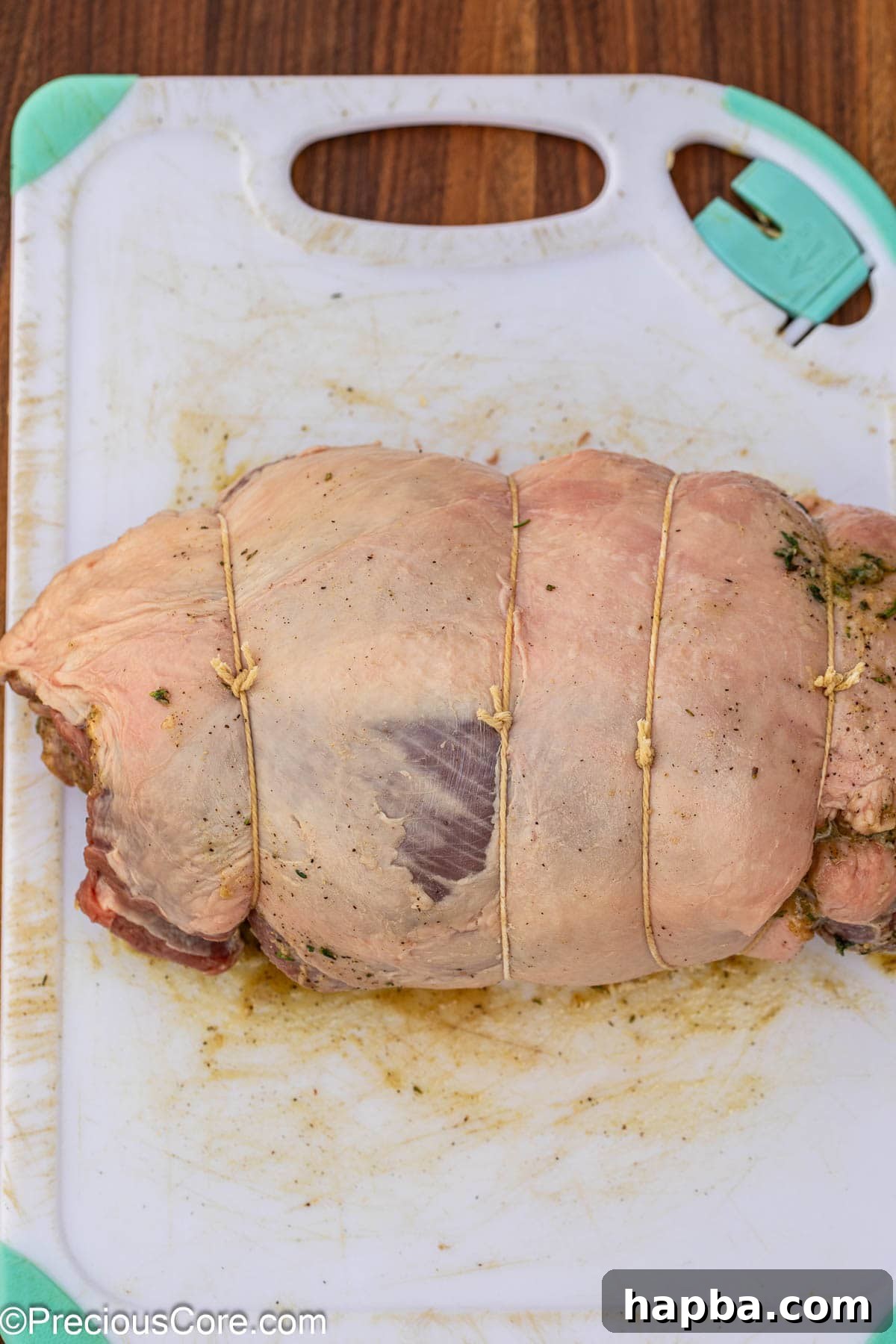 Succulent Boneless Roast Lamb 13 The lamb tightly tied with butcher's twine, ready for marinating.