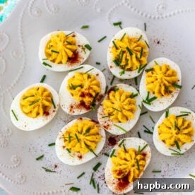 Platter of artfully decorated deviled eggs.