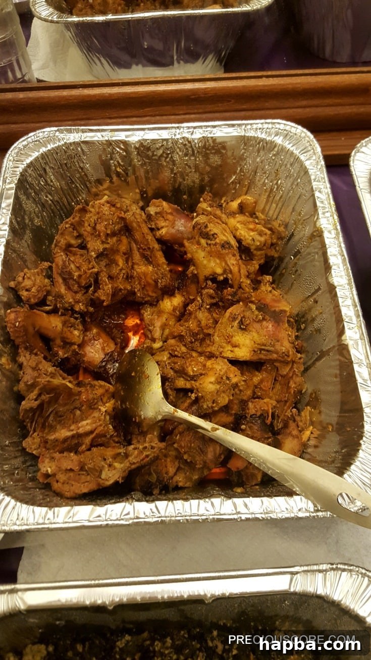 Meeting Update 4 Khati Khati, a renowned Cameroonian smoked chicken dish cooked in palm oil