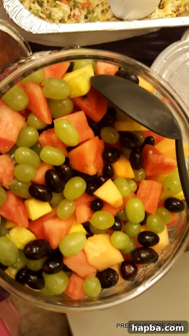 Meeting Update 8 A generous, vibrant bowl of fruit salad, a thoughtful contribution to the feast